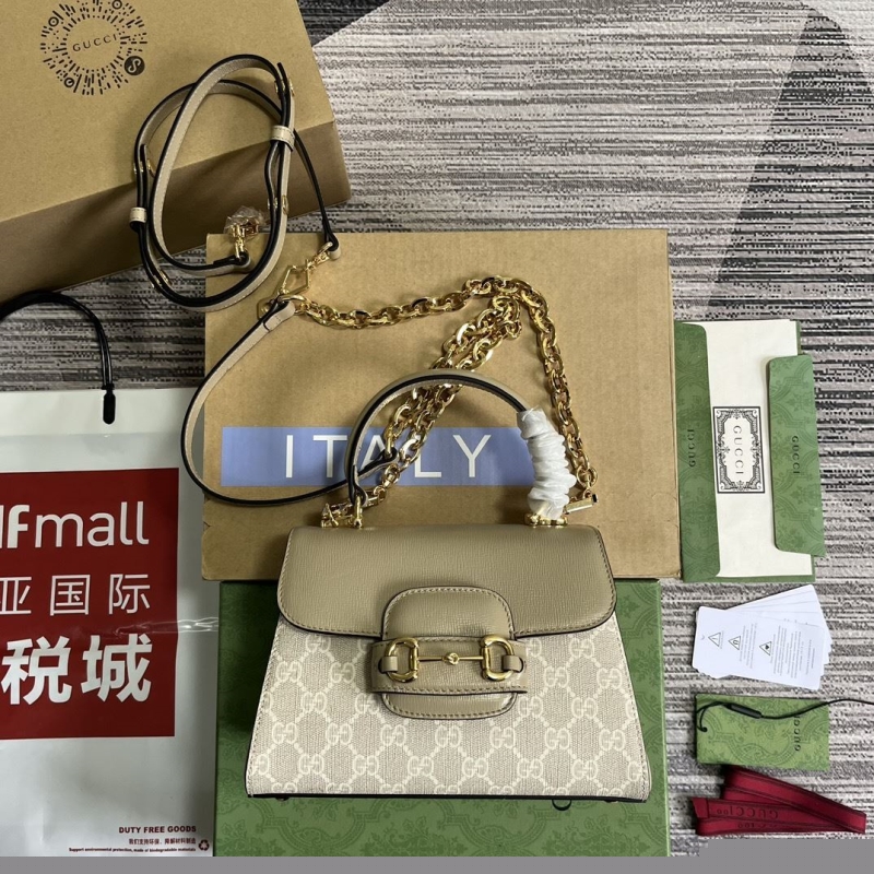 G*u*i top handle bags